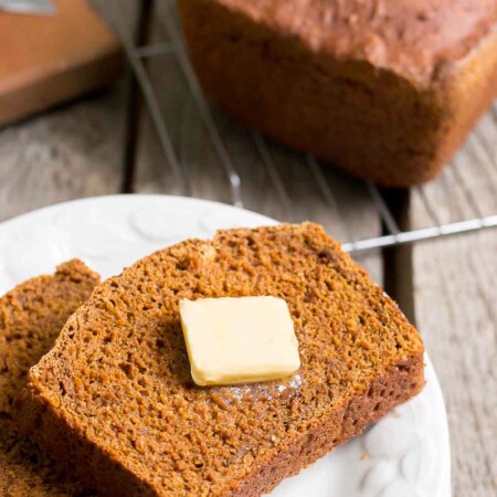 photo of two slices of Icelandic brown bread with a pat of butter