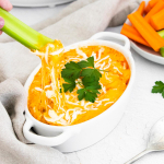 Instant Pot Buffalo Chicken Dip with a celery stick