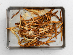 Air Fryer Garlic Fries on baking tray