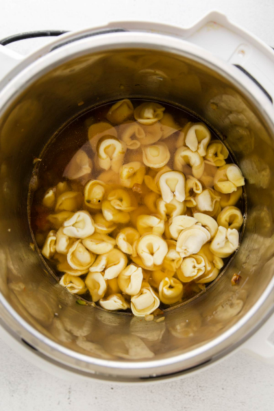 tortellini tossed into the bowl of instant pot