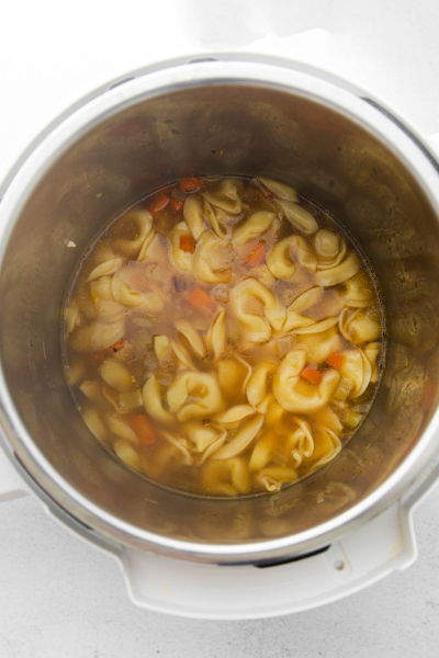 tortellini shown after cooking in instant pot