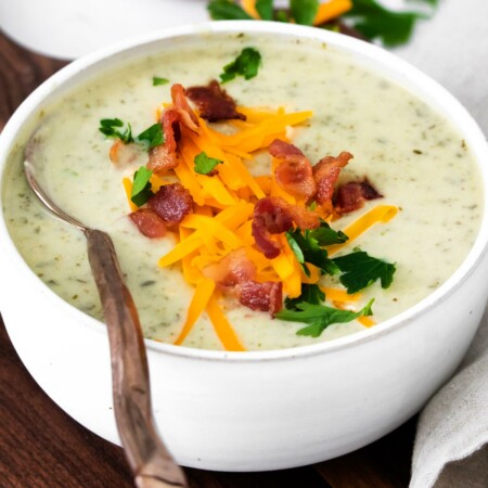 Image of Instant Pot Colcannon Potato Soup that is made with creamy potatoes and nutritious kale and simply seasoned and garnished with crispy bacon. With a vegetarian option.