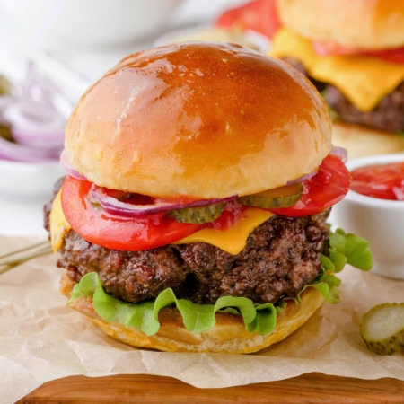 close-up air fryer burger on piece of parchment paper
