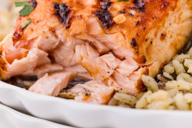 barbequed salmon close-up showing the flakes