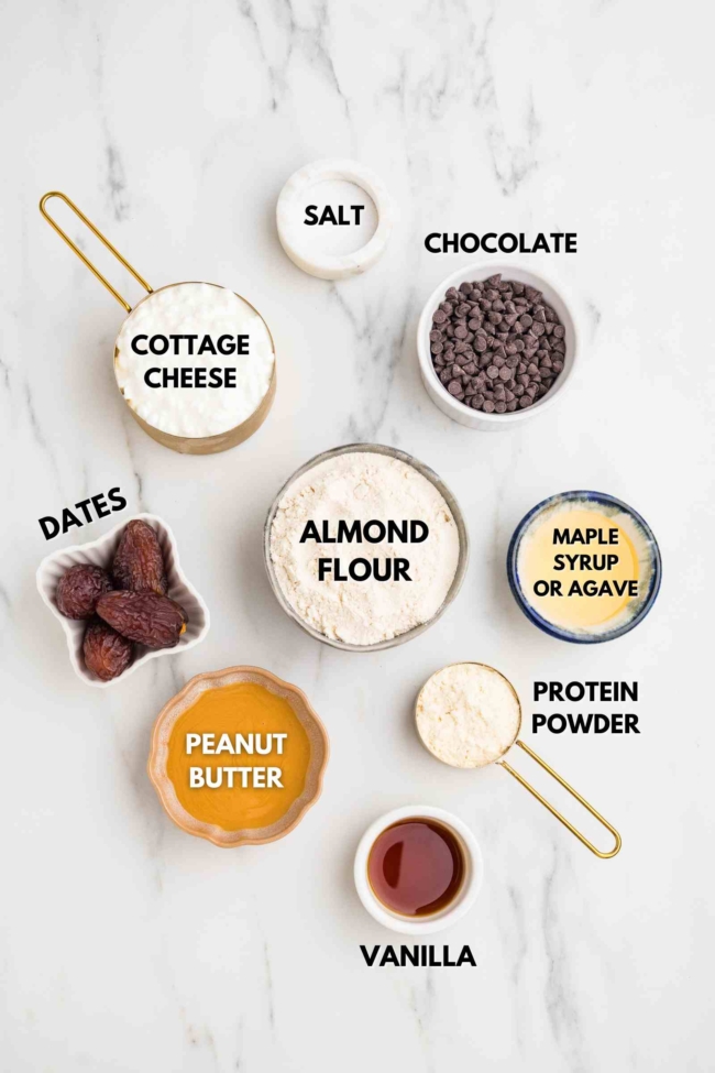 ingredients laid out to make cottage cheese cookie dough on a white table