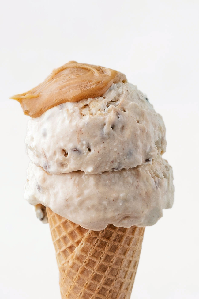 2 scoops of peanut butter cottage cheese ice cream in an ice cream cone