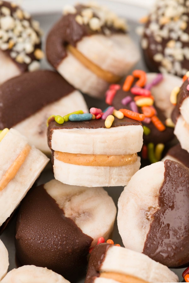 close-up of peanut butter bananas in a white bowl