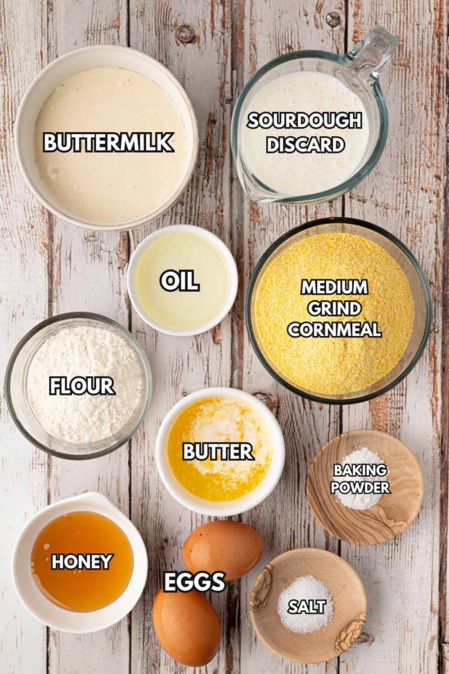 Ingredients for sourdough cornbread including sourdough discard, cornmeal, flour, buttermilk, eggs, butter and honey
