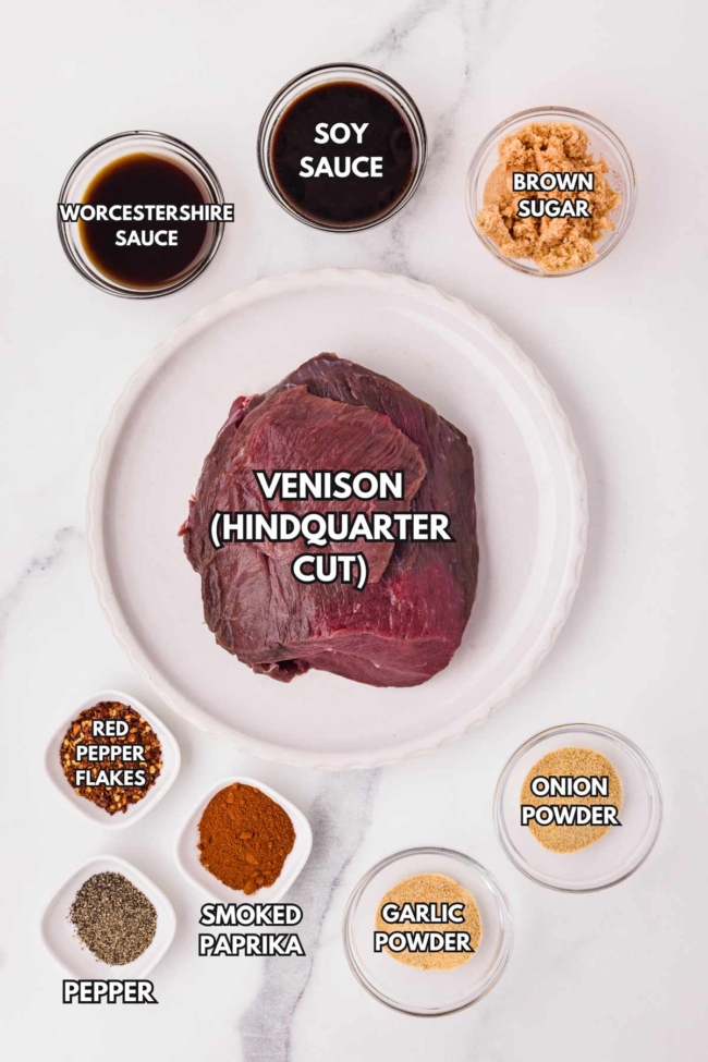 Ingredients for venison jerky, including hindquarter cut, soy sauce, Worcestershire sauce, and various spices.